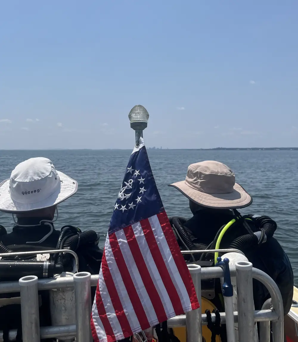 Divers at the bow of Lady Kasey near Polling Brothers Wreck